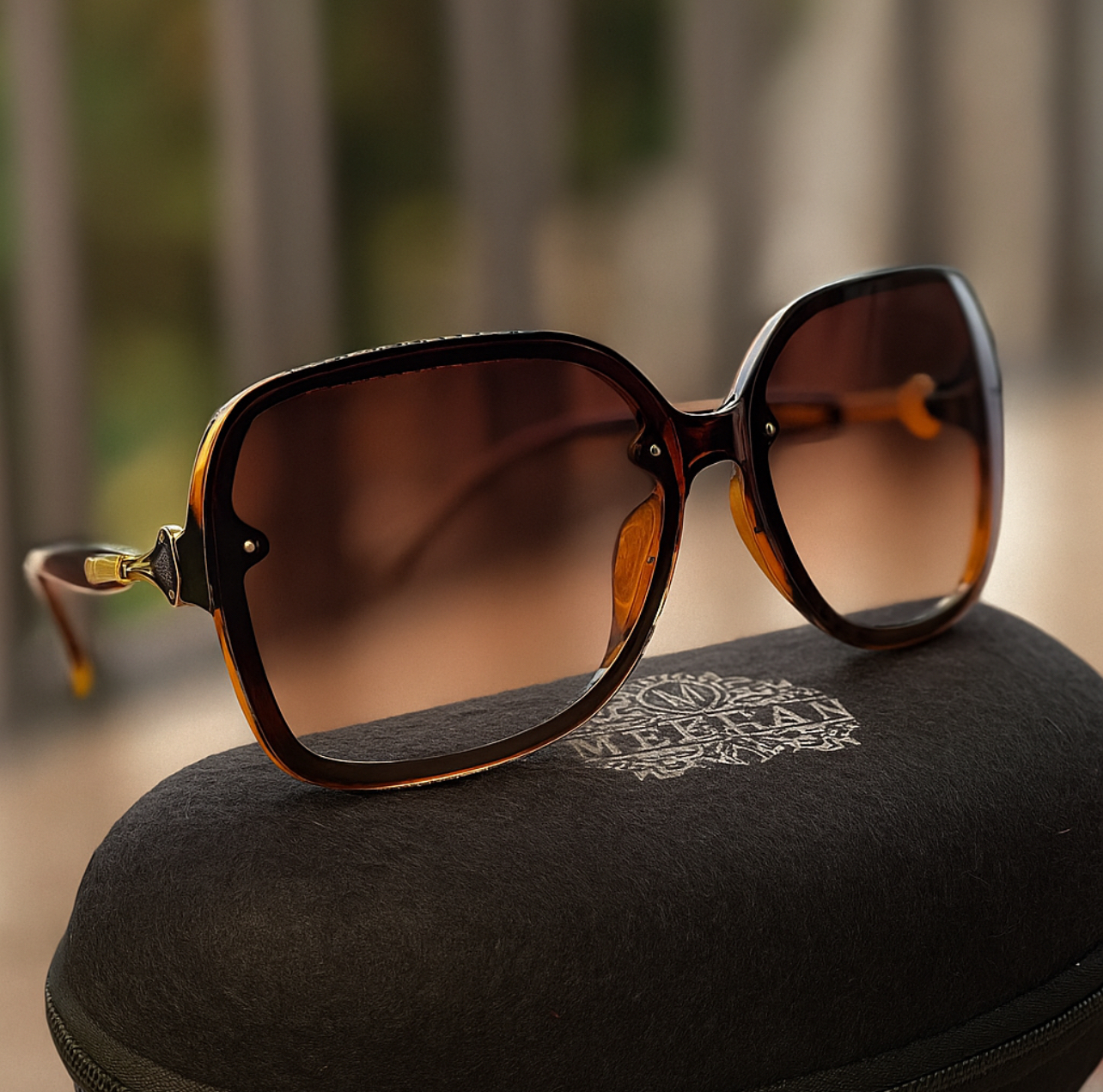Meeran Charm sunglasses with a brown-to-pink gradient lenses and a cream-colored frame, featuring UV protection.