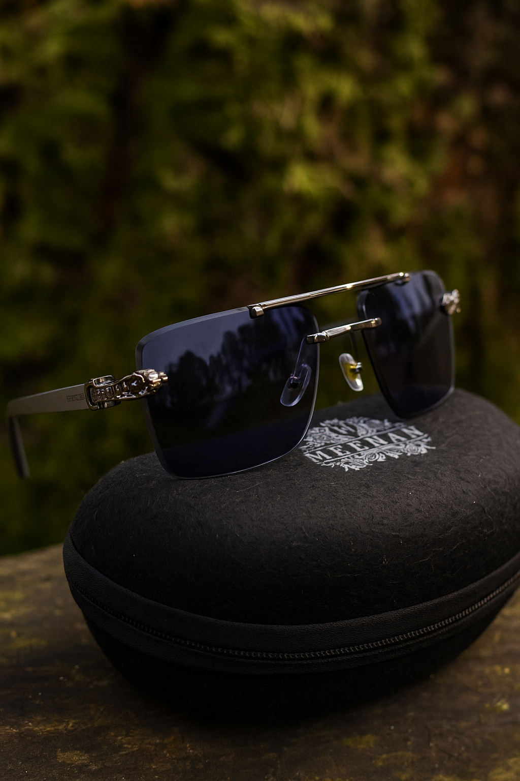 Meeran ROYAL sunglasses with brown lenses frame and a black/grey gradient frame, featuring UV protection