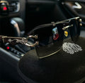 Meeran Jaguar sunglasses with gradient black lenses and a black/silver frame, featuring UV protection
